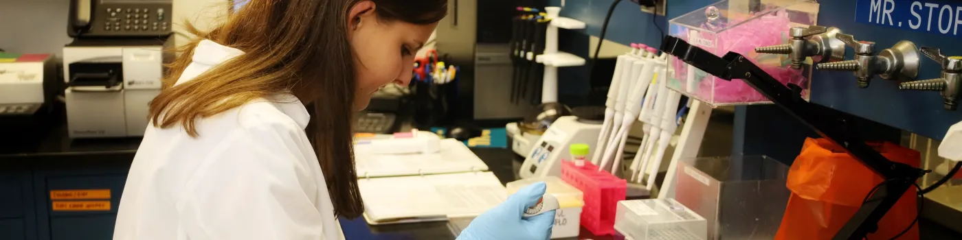Woman working at lab bench