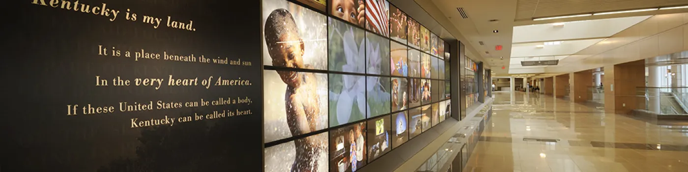 Chandler Medical Center display screen; "Kentucky is my land, It is a place beneath the wind and sun, In the very heart of America. If these United States can be called a body, Kentucky can be called its heart."