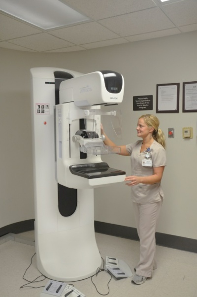 Mammography machine; operator standing to side