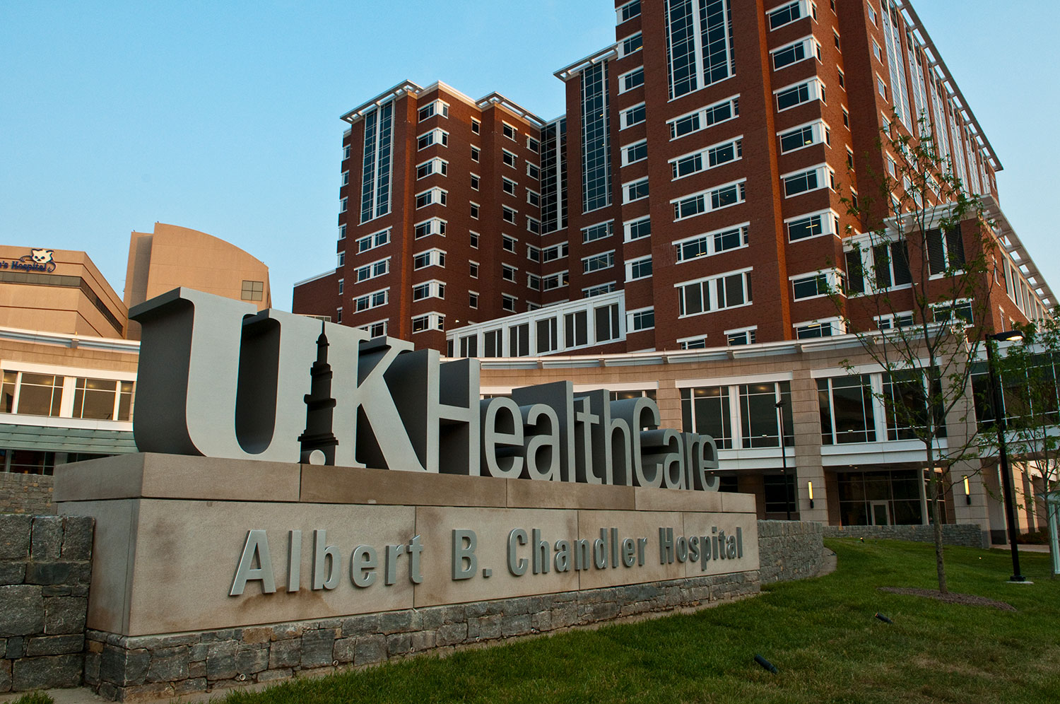 UK HealthCare Albert B. Chandler Hospital sign with building in background