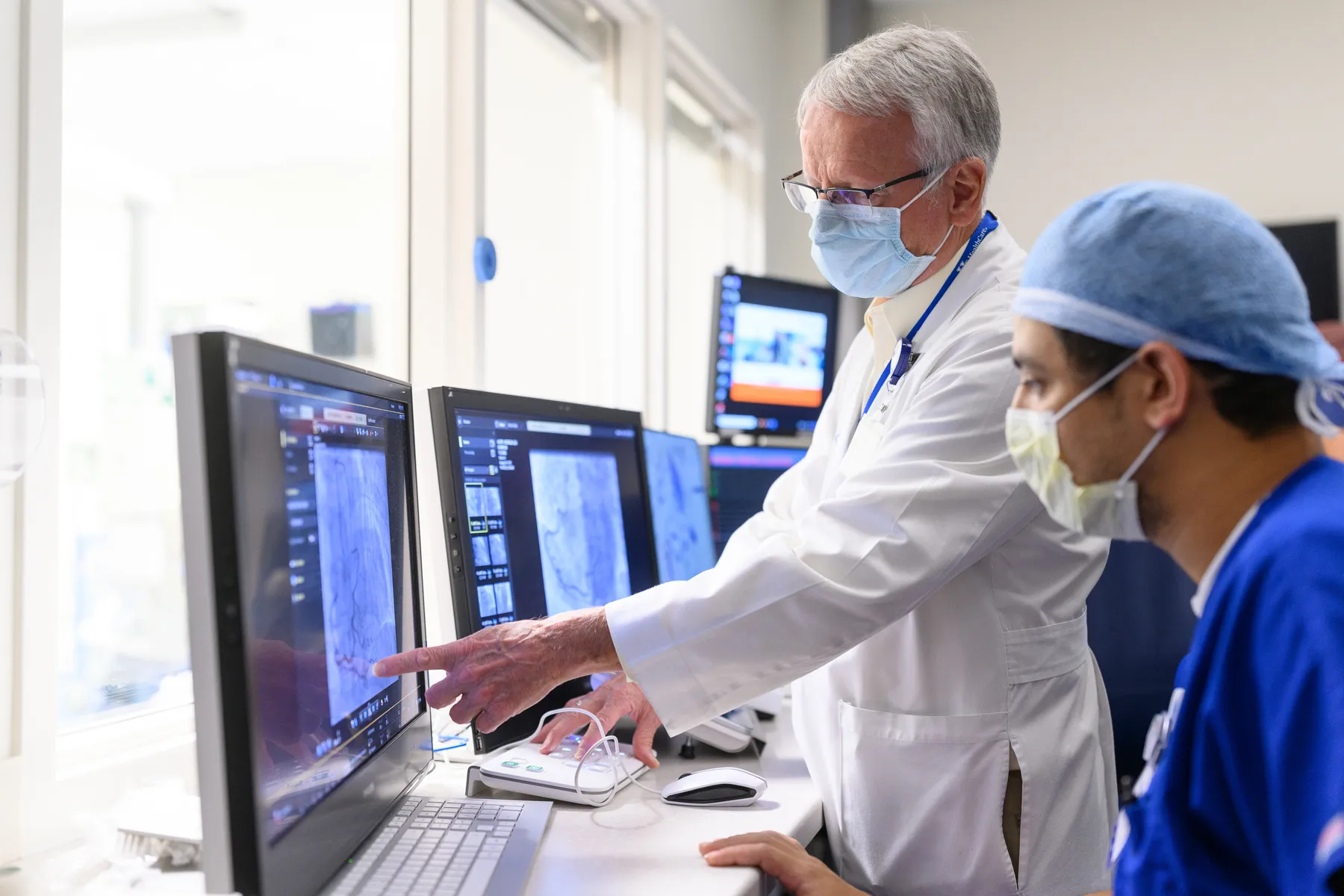 cardiologist looking at scan