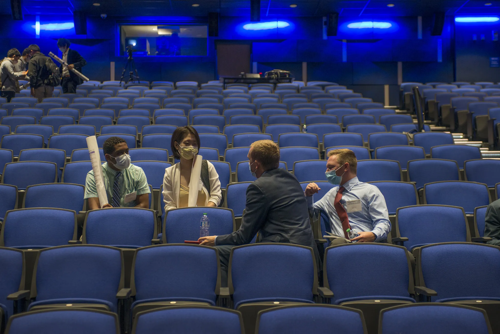 People talking after a seminar