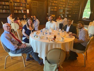 L to R: Drs. Douglas Cunningham, Mandy Brasher, Maher Ajour, Ravi Bhavsar, and Anthony Haase pose for a picture at the 2022 graduation reception.