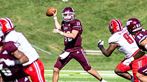 Eastern Kentucky University football player with the ball during a game