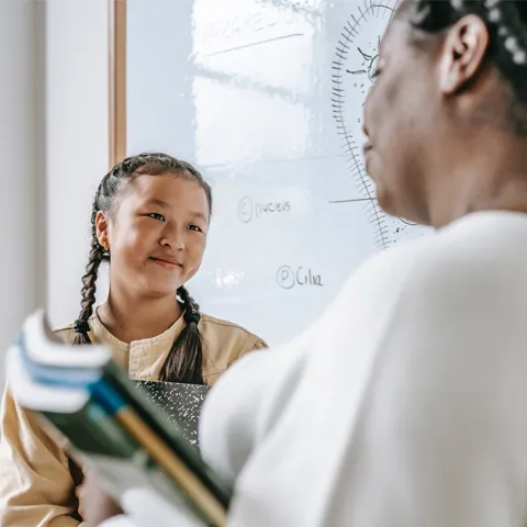 Little girl and her teacher