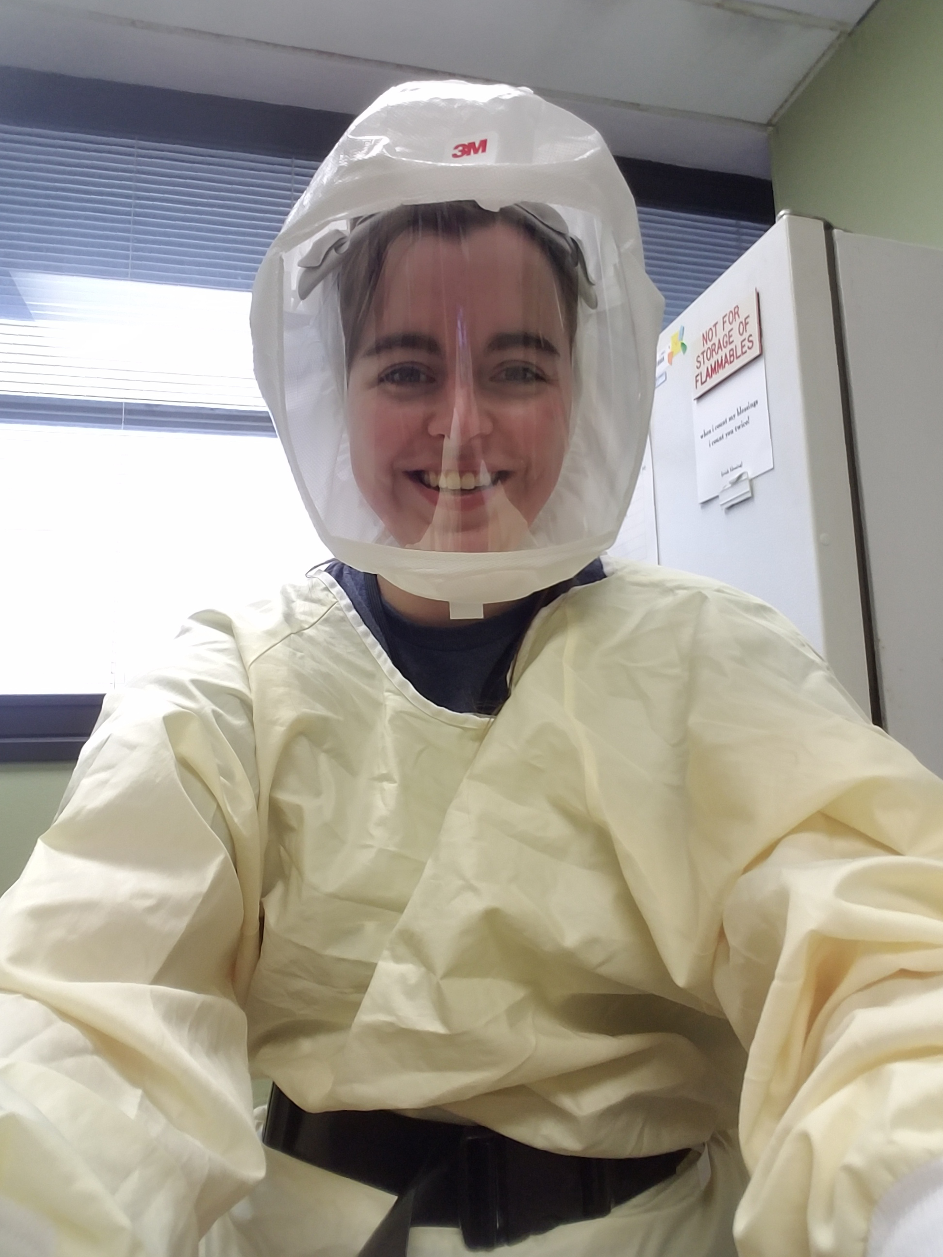 a picture of Frances Meredith in a Hazmat Suit 