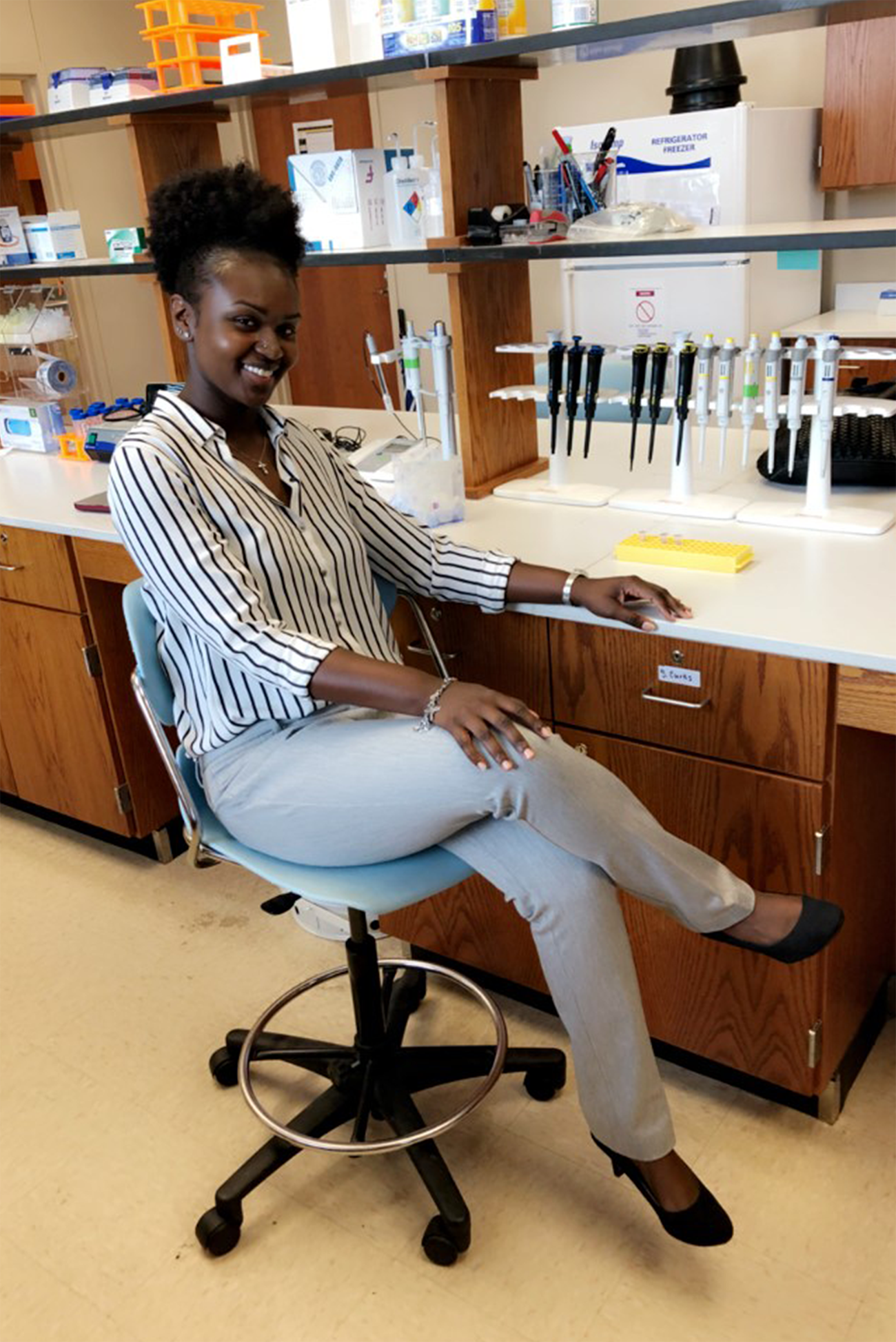 Jordan Brown sitting at a lab station.