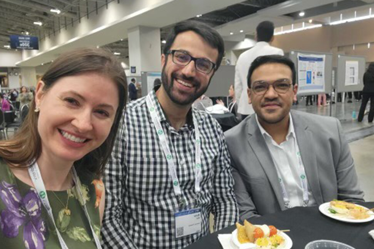 Fellow Mandy Brasher, Maher Ajour, and Ravi Bhavsar grab a snack a PAS 2023