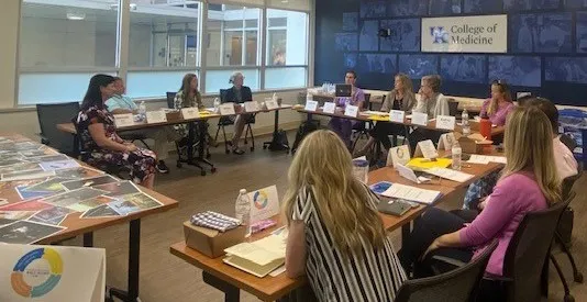 Group of adults in a classroom setting