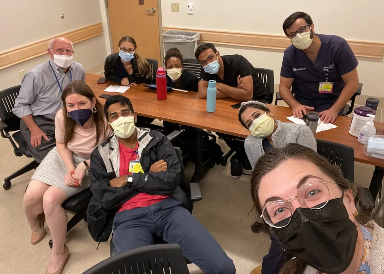 Dr. Cunnigham and fellows gathered for a selfie post-lecture.