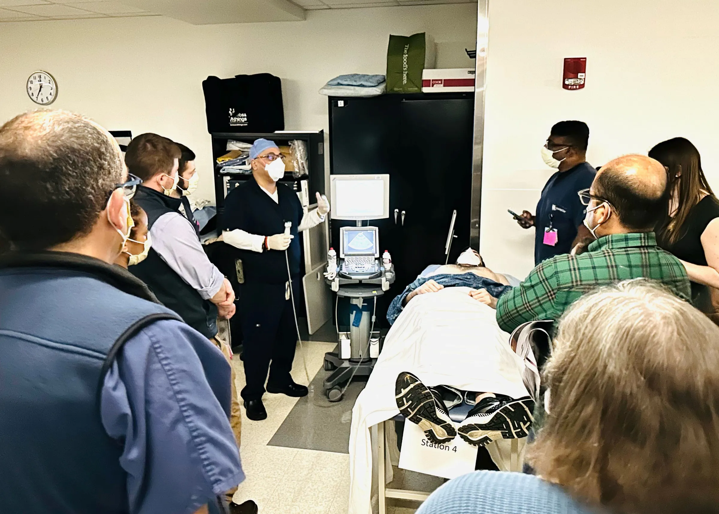 Faculty and Fellows in a POCUS simulation.