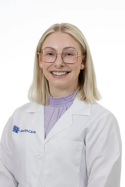 headshot of collier in white coat