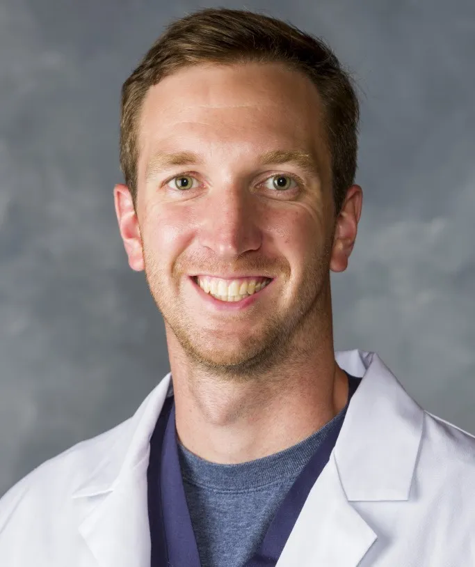 Peter Blosser smiling for headshot