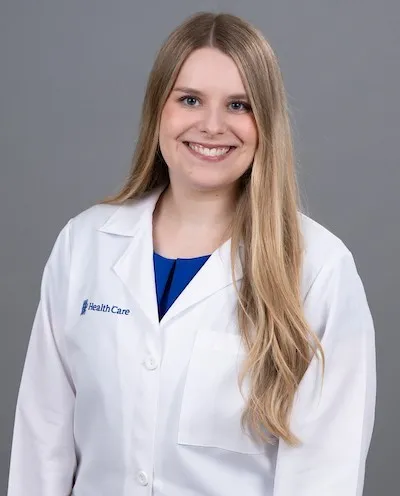 Karly Gruett smiling for headshot