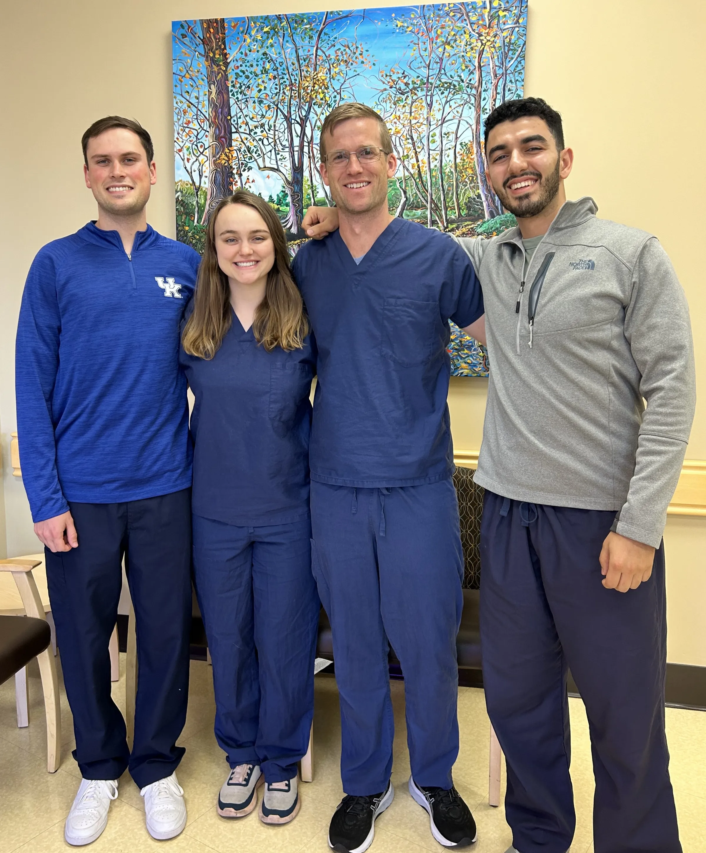 PGY2 Ophthalmology residents standing together smiling