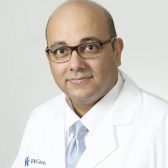Sanjay Dhar in white coat