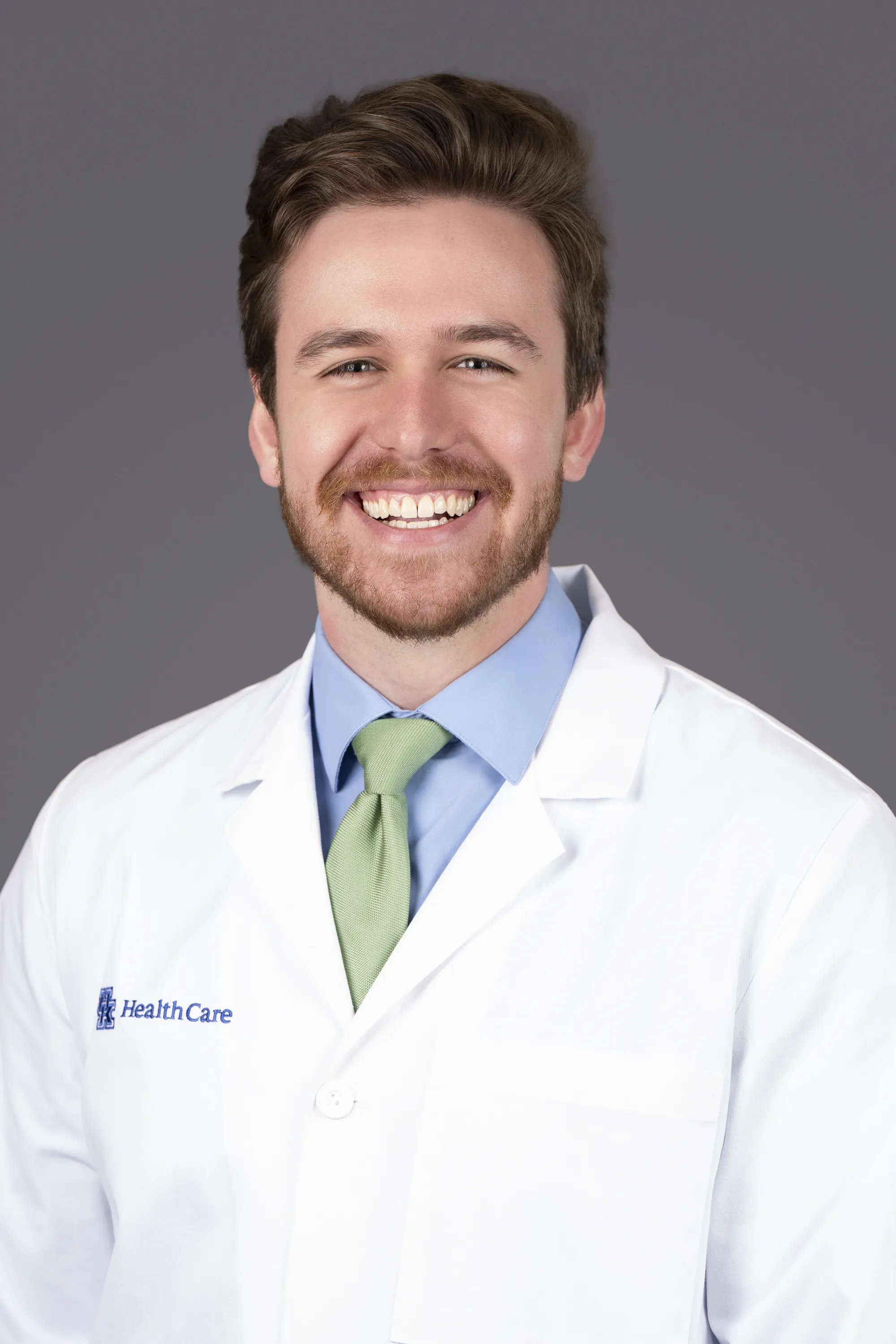 headshot of osterhaus in white coat