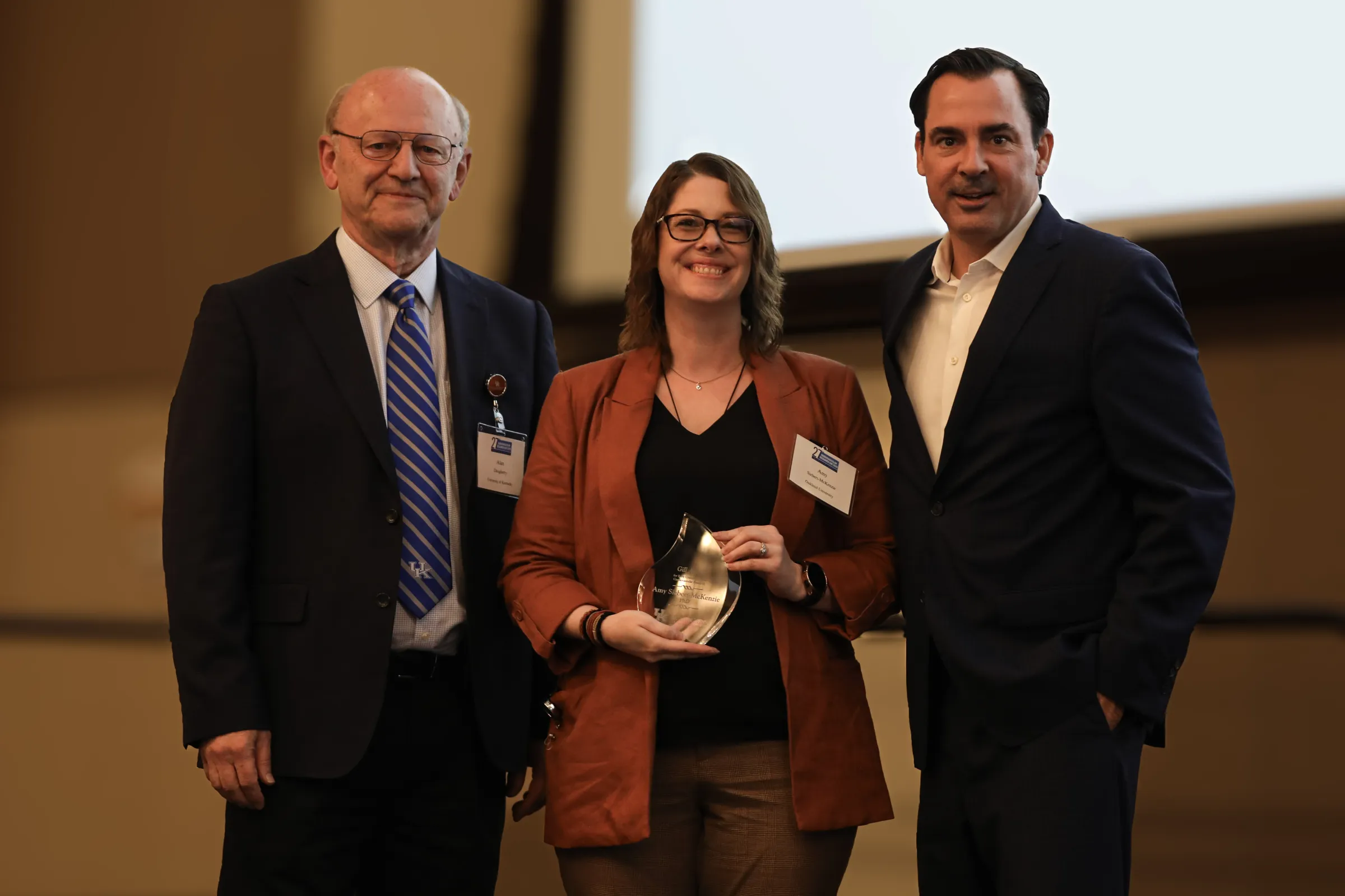 Alan Daugherty, Amy Siebert-McKenzie, Jason Gill during the Gill Awards at Cardiovascular Research Day.