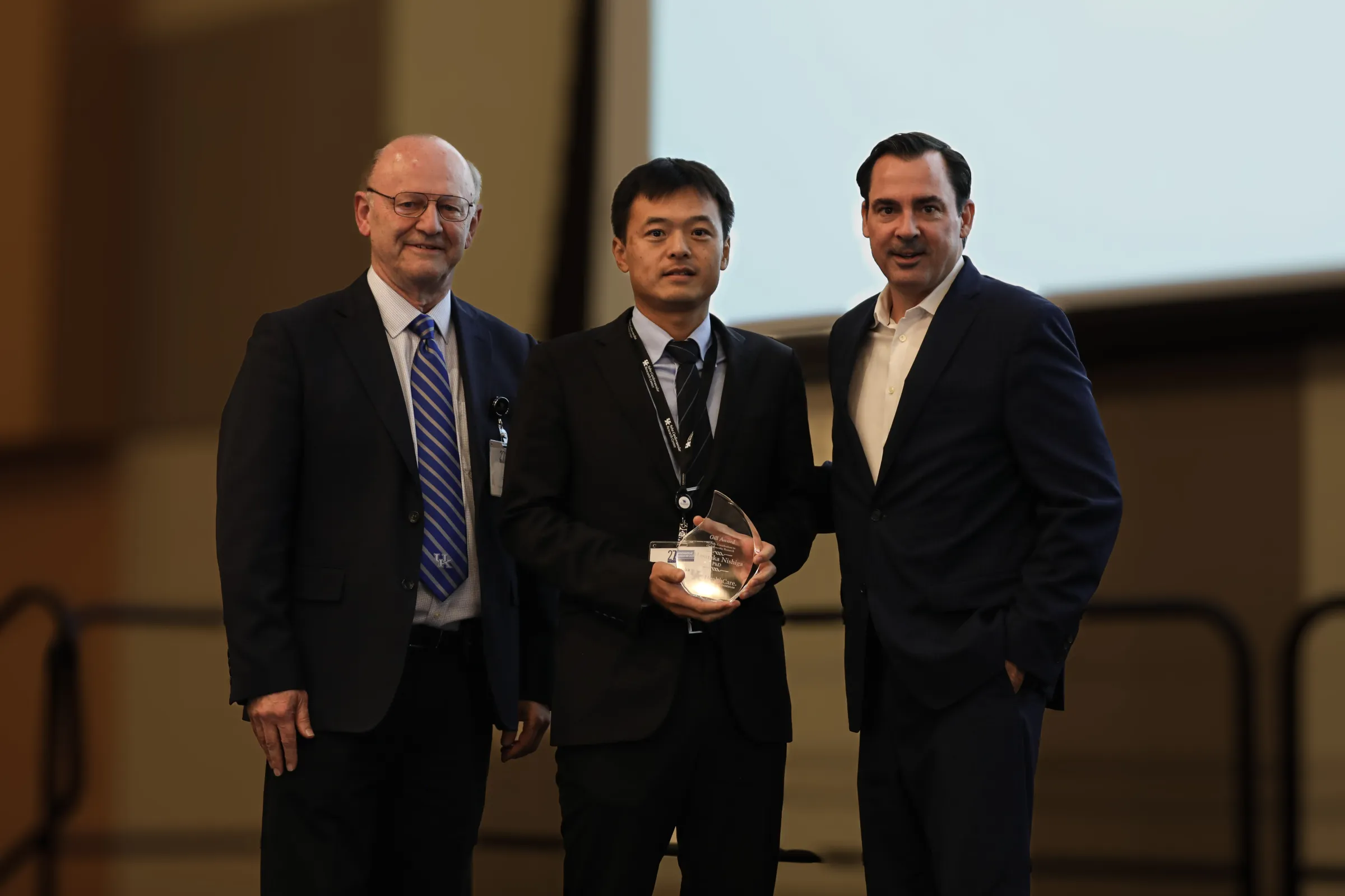 Alan Daugherty, Masataka Nishiga, Jason Gill during the Gill Awards at Cardiovascular Research Day.