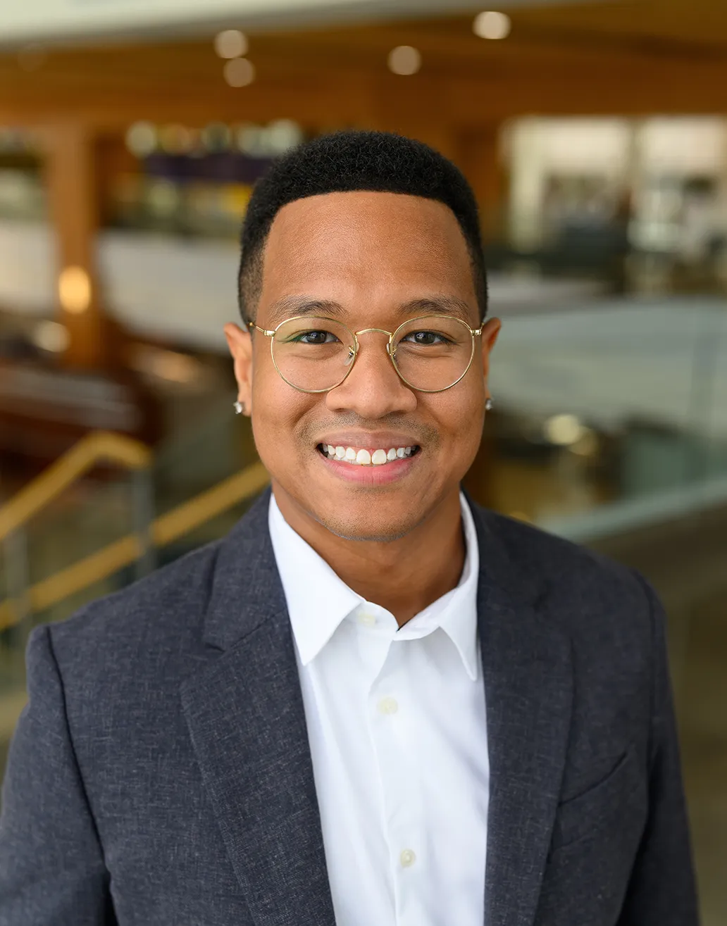 Image of Dr. Delvon Mattingly, a black man with short black hair wearing glasses, a white dress shirt and blazer