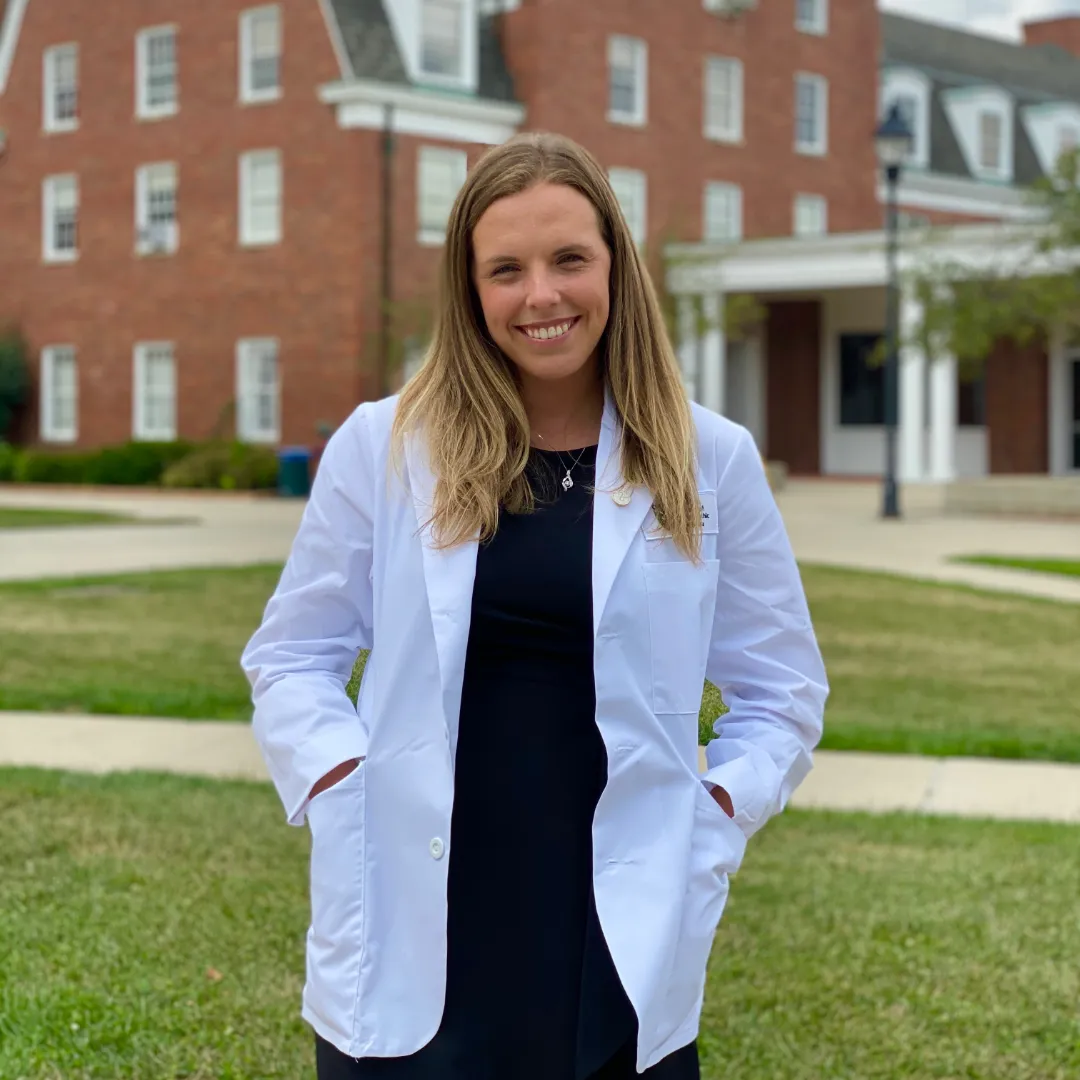 Headshot of Alyssa Lambrecht in her white coat
