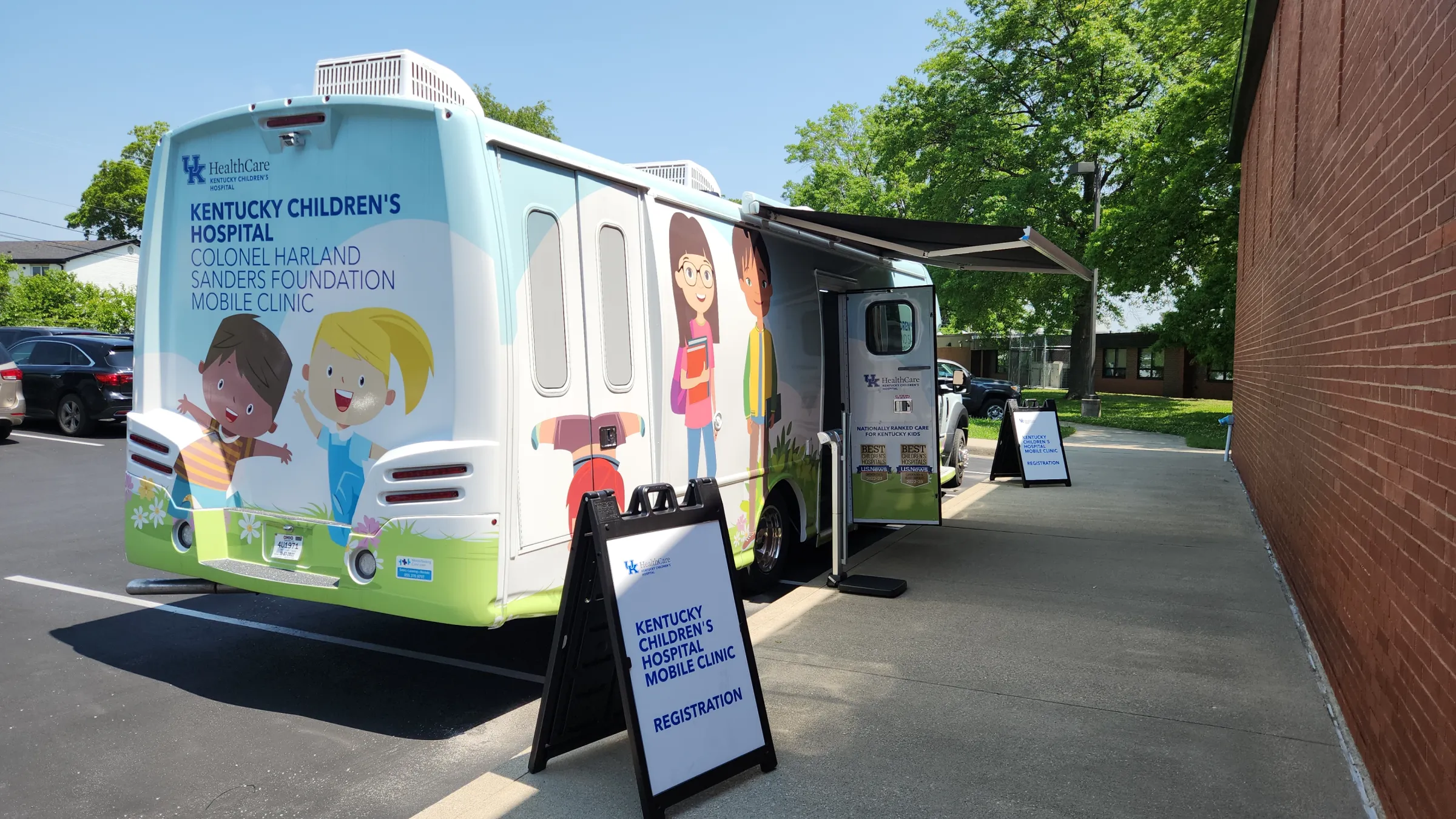 Photo of our Pediatric Mobile Eye Unit outside of an elementary school