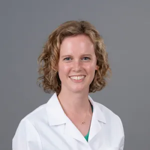 headshot of dr. lank, in white coat