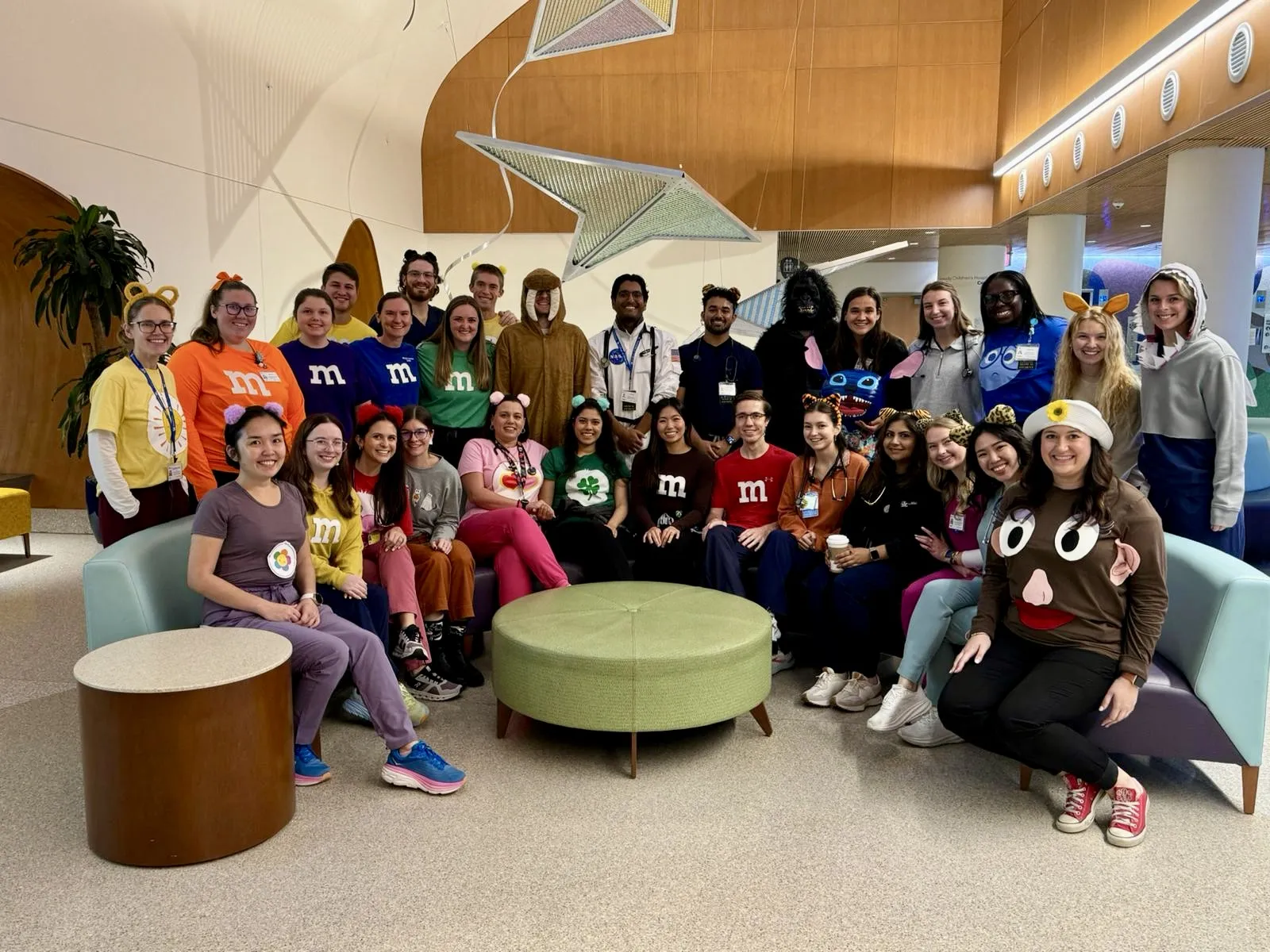 Group of workers in halloween costumes