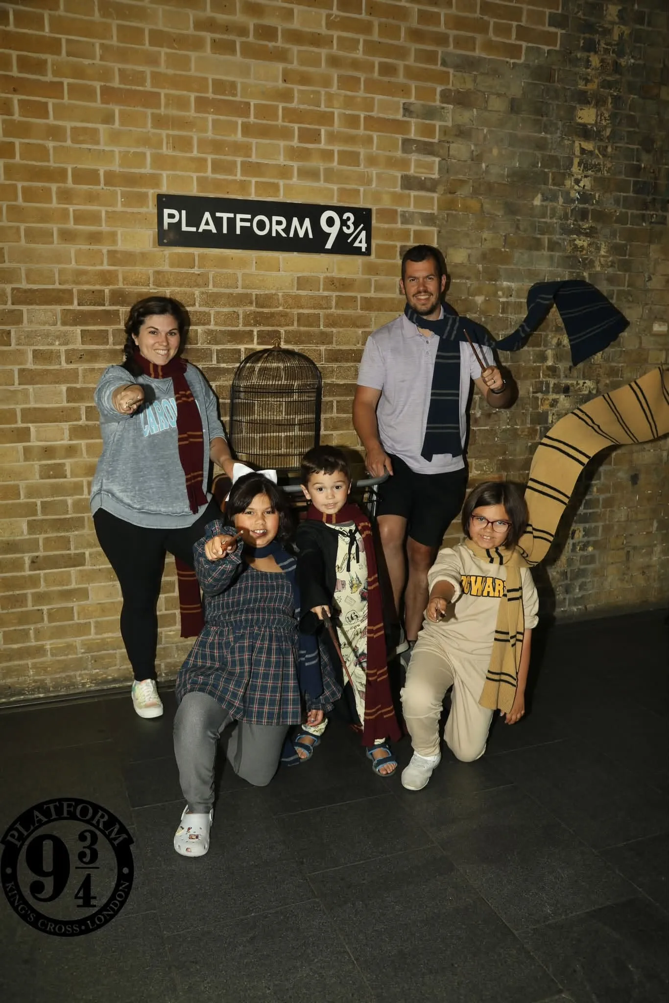 hubbard family in london at platform 9 and three quarters