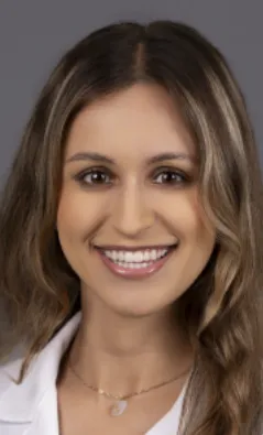 headshot of dr. centner in white coat