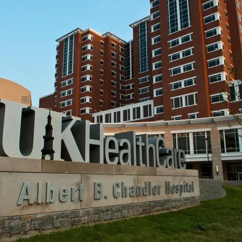 UK HealthCare Albert B. Chandler Hospital sign with building in background