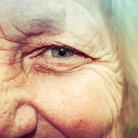 Close up of an elderly woman's eye.