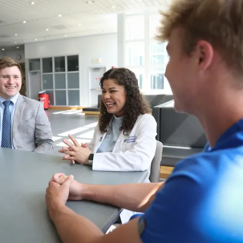 Student talking to two people in the BBSRB
