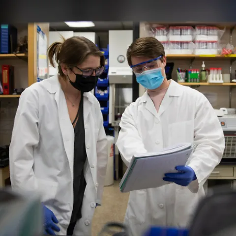 microbiology department laboratory with two researchers