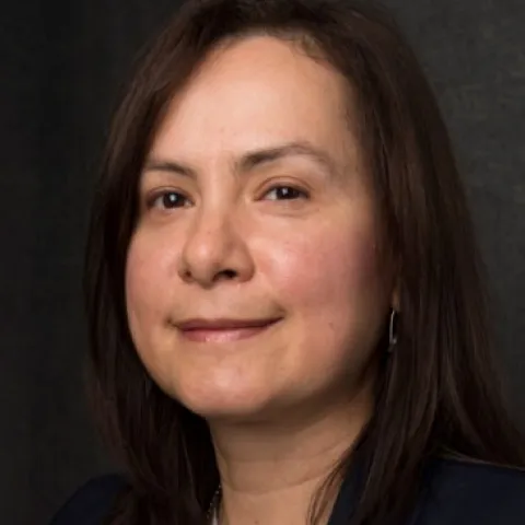 a headshot style photo of Dr. Hülya Bayir 