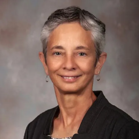 a headshot style photo of Dr. Regina C. Armstrong 