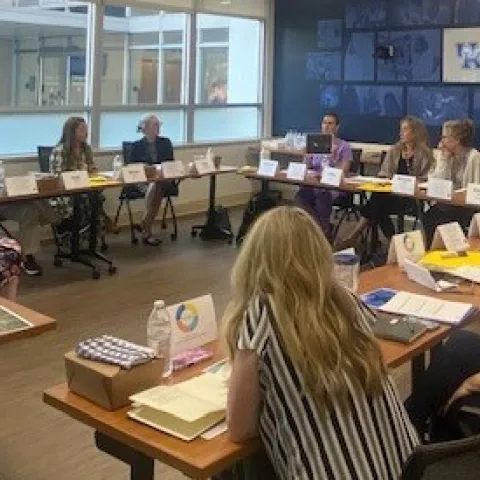 Group of adults in a classroom setting