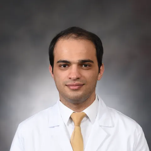 Male provider in white coat