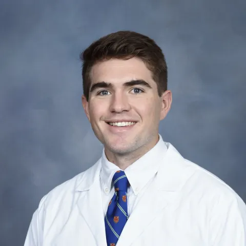 Male provider in white coat