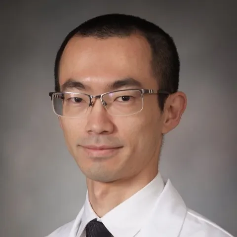 Male provider in white coat