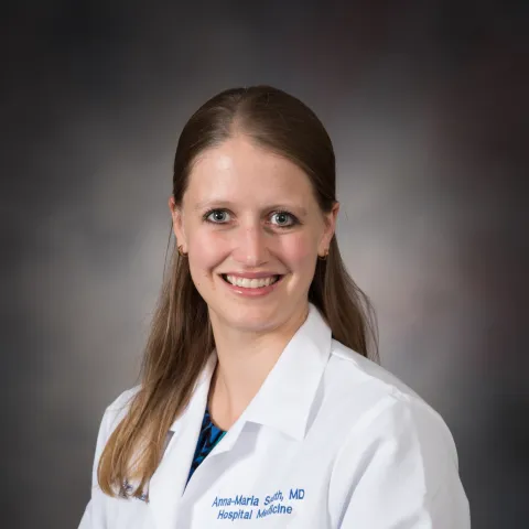 Female provider in white coat