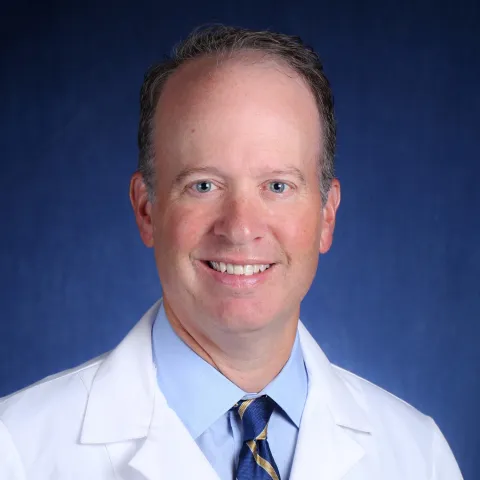 Picture of UK Ophthalmology Chair Dr. Bradford Tannen in white coat