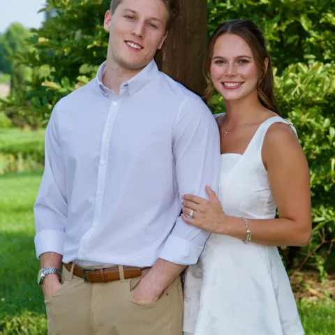 Male and Female standing outside together