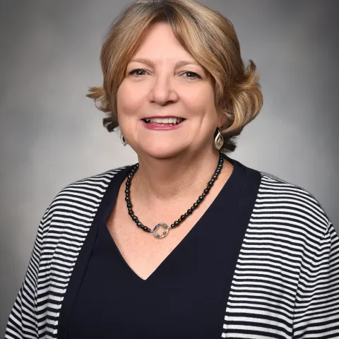 Alice Thornton smiles for a headshot