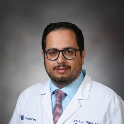 Male provider in white coat