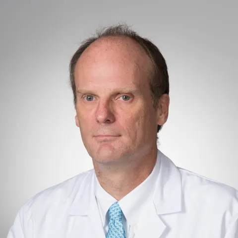 Male provider in white coat