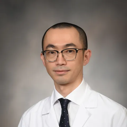 Male provider in white coat