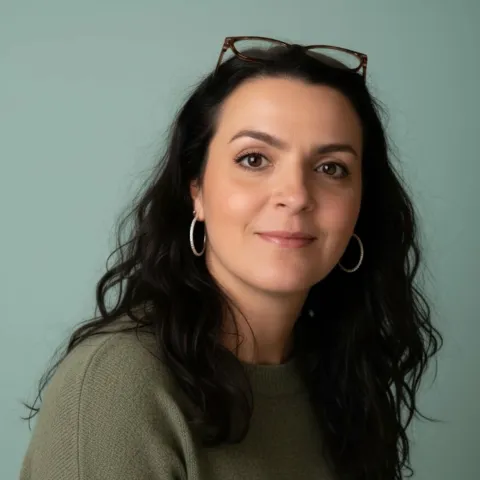 Female in green shirt