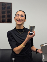 Dr. Aristizabal Ramirez displays her commemorative personalized julep cup, part of a Department of Physiology tradition.