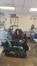 Akua Asamoah in a track chair